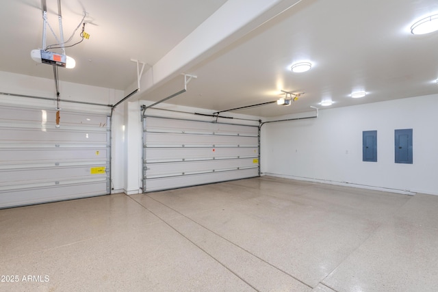 garage featuring electric panel and a garage door opener