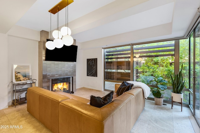 7131 E Rancho Vista Dr Unit 1008, Scottsdale, AZ 85251 - living area featuring a tiled fireplace