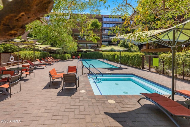 7131 E Rancho Vista Dr Unit 1008, Scottsdale, AZ 85251 - community pool with a patio