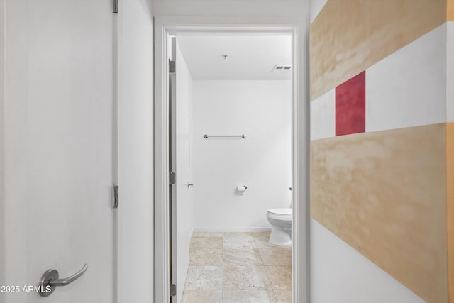 7131 E Rancho Vista Dr Unit 1008, Scottsdale, AZ 85251 - bathroom featuring toilet and baseboards