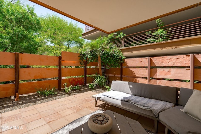 7131 E Rancho Vista Dr Unit 1008, Scottsdale, AZ 85251 - view of patio / terrace featuring outdoor lounge area and fence