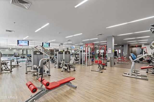 7131 E Rancho Vista Dr Unit 1008, Scottsdale, AZ 85251 - workout area with wood finished floors