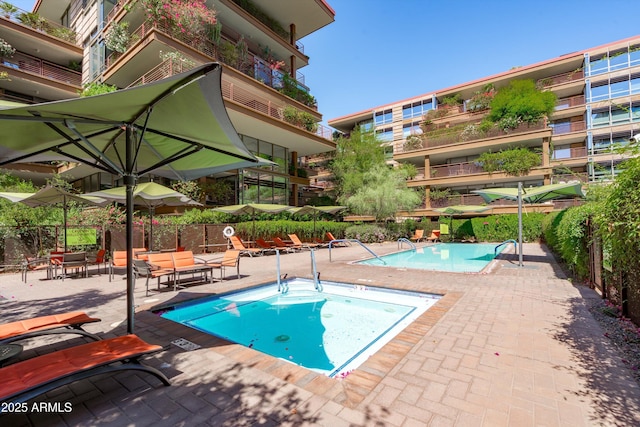 7131 E Rancho Vista Dr Unit 1008, Scottsdale, AZ 85251 - community pool featuring a patio area