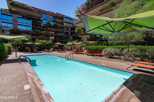 7131 E Rancho Vista Dr Unit 1008, Scottsdale, AZ 85251 - community pool featuring a patio