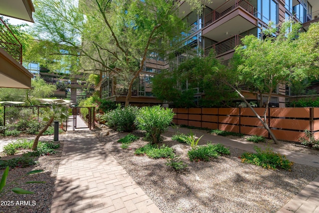 7131 E Rancho Vista Dr Unit 1008, Scottsdale, AZ 85251 - view of home's community with a gate and fence
