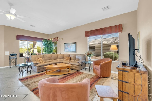 4240 E Strawberry Dr, Gilbert, AZ 85298 - living area with baseboards, light tile patterned floors, ceiling fan, and visible vents