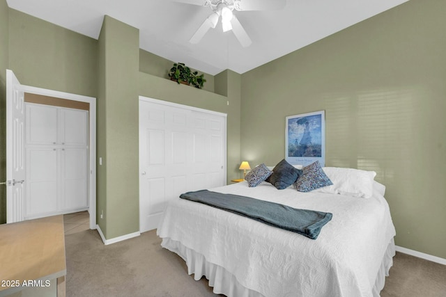 4240 E Strawberry Dr, Gilbert, AZ 85298 - bedroom with a closet, light colored carpet, baseboards, and a ceiling fan