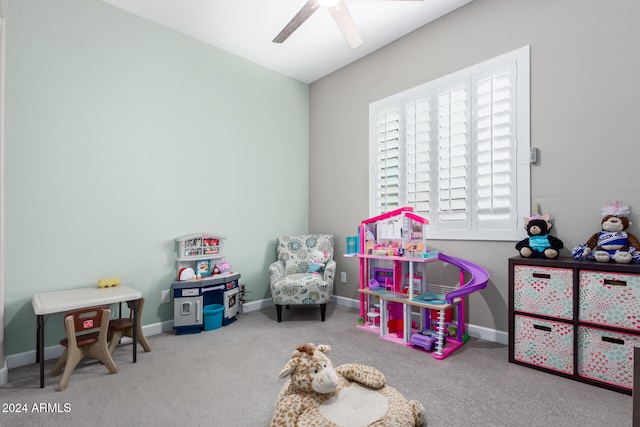 rec room with ceiling fan and carpet flooring