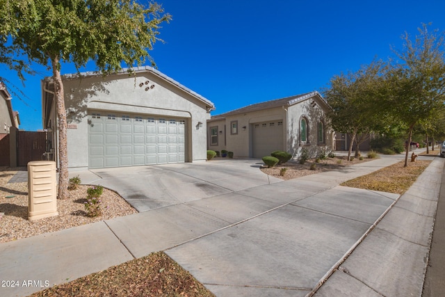 ranch-style house featuring a garage