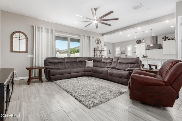 living room with ceiling fan