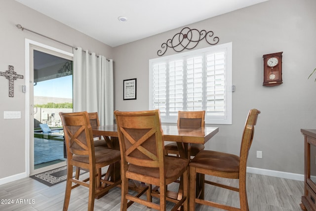 dining room featuring light hardwood / wood-style floors