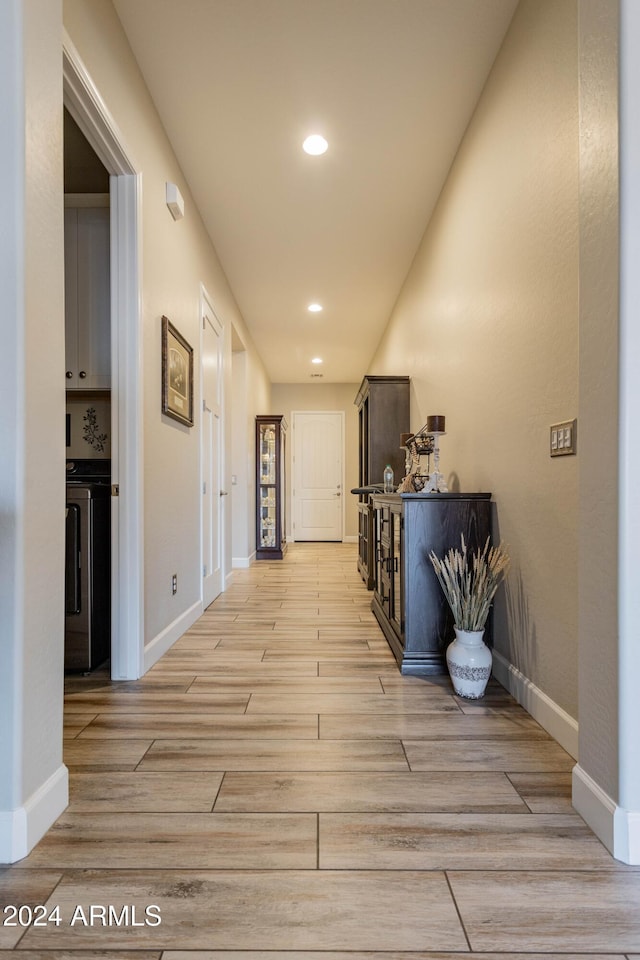 hallway featuring light hardwood / wood-style floors