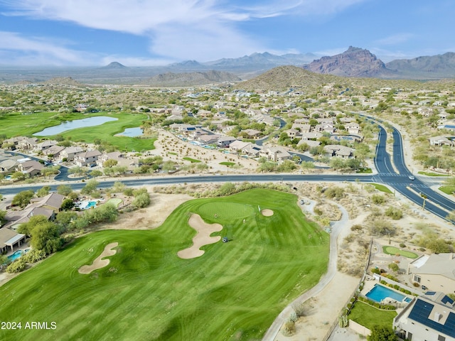 bird's eye view with a water and mountain view