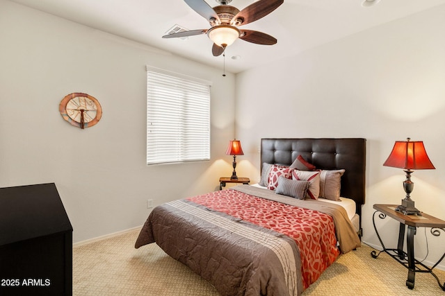 bedroom with light carpet and ceiling fan