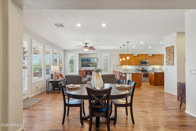 28351 N 130th Dr, Peoria, AZ 85383 - dining area featuring recessed lighting, light wood-type flooring, baseboards, and a ceiling fan