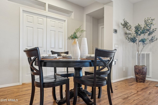 28351 N 130th Dr, Peoria, AZ 85383 - dining room with light wood-style floors and baseboards
