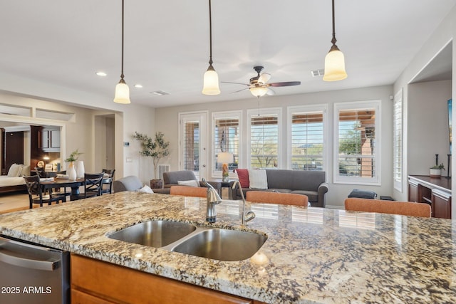 28351 N 130th Dr, Peoria, AZ 85383 - kitchen with open floor plan, a sink, stainless steel dishwasher, ceiling fan, and recessed lighting
