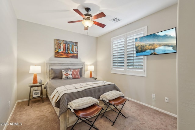 28351 N 130th Dr, Peoria, AZ 85383 - bedroom featuring baseboards, light carpet, and ceiling fan