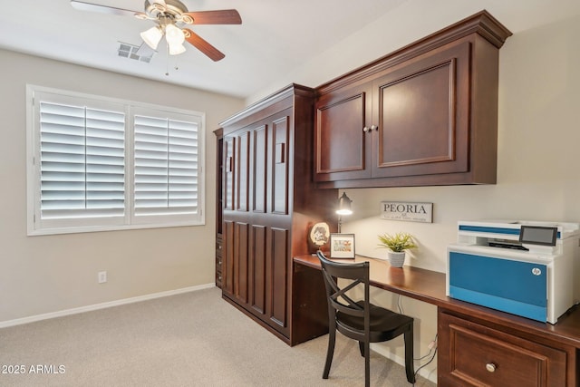28351 N 130th Dr, Peoria, AZ 85383 - home office with a ceiling fan, baseboards, and light carpet