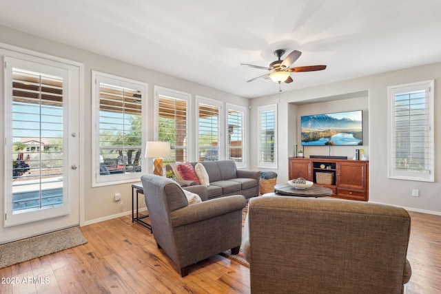 28351 N 130th Dr, Peoria, AZ 85383 - living room with ceiling fan, healthy amount of natural light, and baseboards