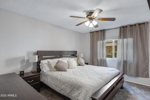 bedroom featuring carpet, ceiling fan, and a textured ceiling