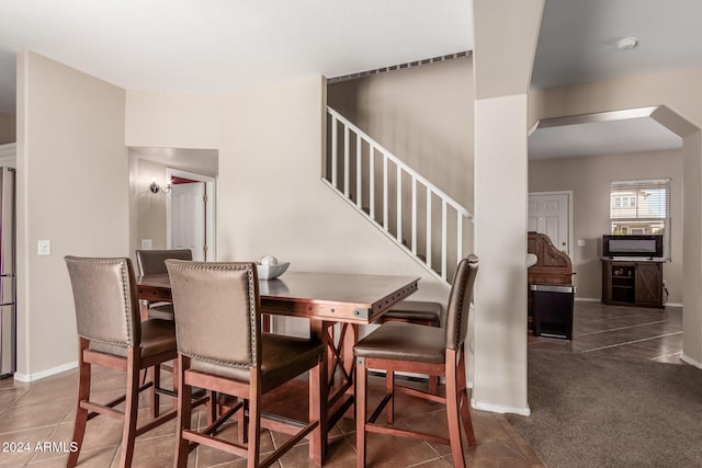 view of tiled dining space