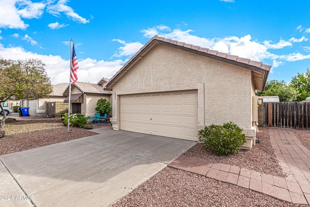 view of front of property featuring a garage