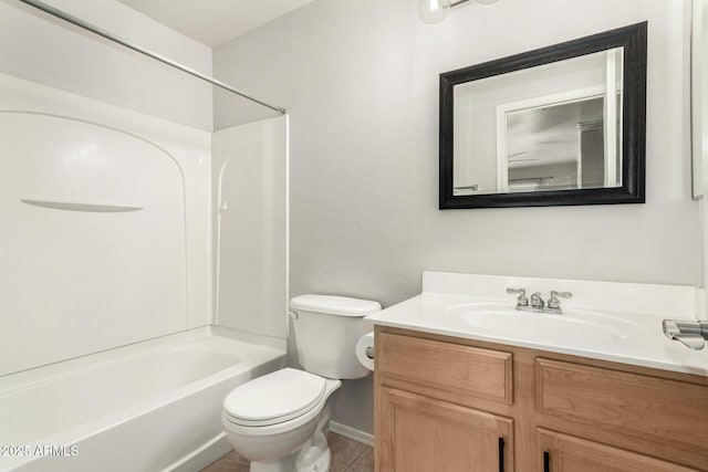 full bath with toilet, shower / bathing tub combination, vanity, and tile patterned floors