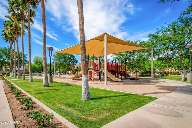 communal playground with a lawn