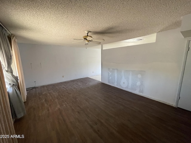 8114 E Jackrabbit Rd, Scottsdale, AZ 85250 - unfurnished room with wood finished floors, a ceiling fan, and a textured ceiling