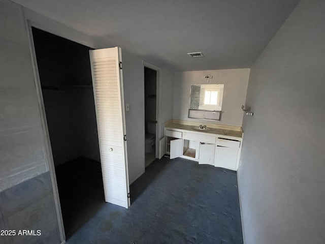 8114 E Jackrabbit Rd, Scottsdale, AZ 85250 - bathroom with toilet and vanity