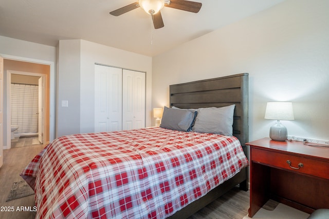 bedroom with a closet, ceiling fan, and wood finished floors