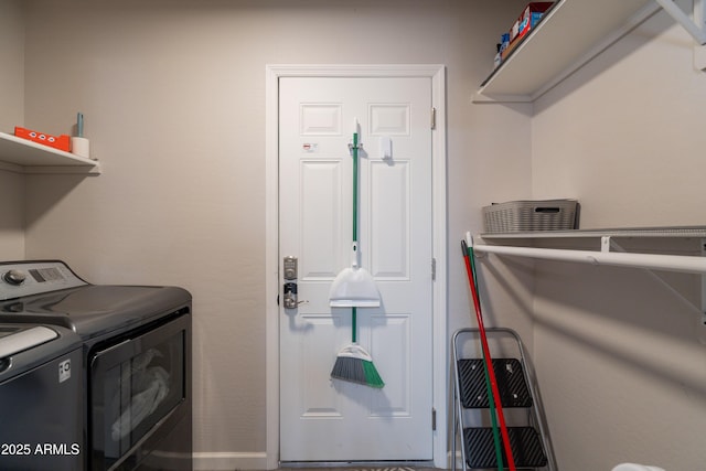 laundry area with laundry area and washing machine and dryer