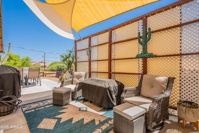 view of patio / terrace with grilling area and an outdoor hangout area
