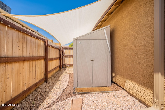 exterior space with a fenced backyard