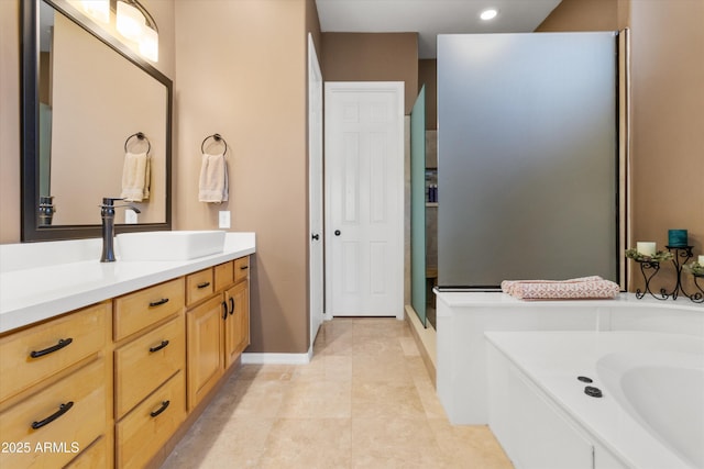 bathroom with vanity and walk in shower