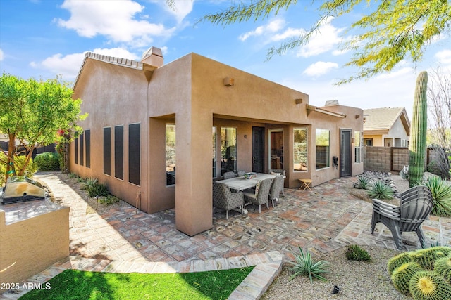 rear view of property with a patio area