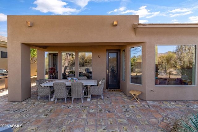 view of patio with a grill