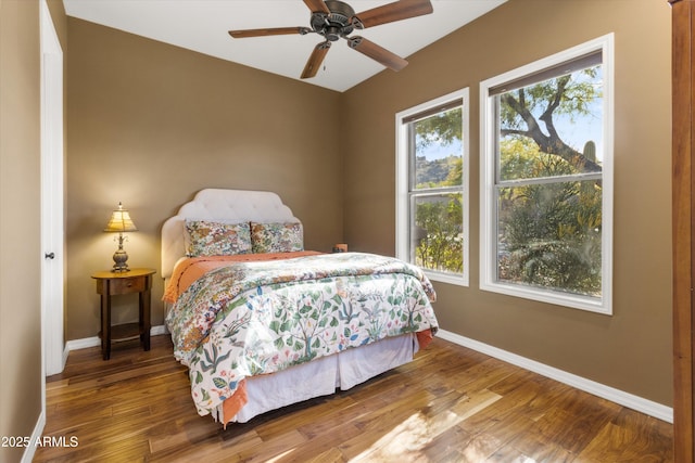 bedroom featuring ceiling fan and hardwood / wood-style floors