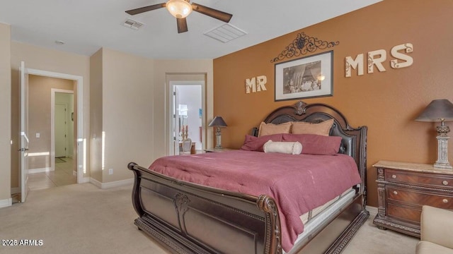 bedroom with light carpet and ceiling fan