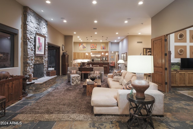 living room featuring a fireplace