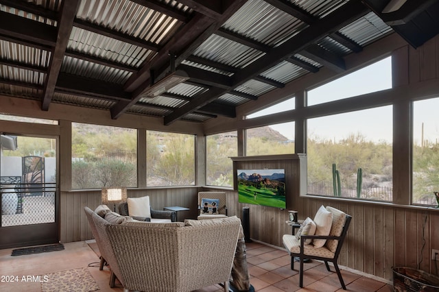 sunroom / solarium with lofted ceiling