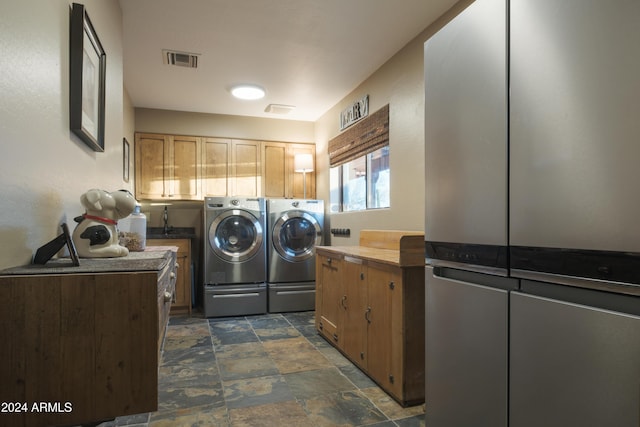 laundry area featuring washer and clothes dryer