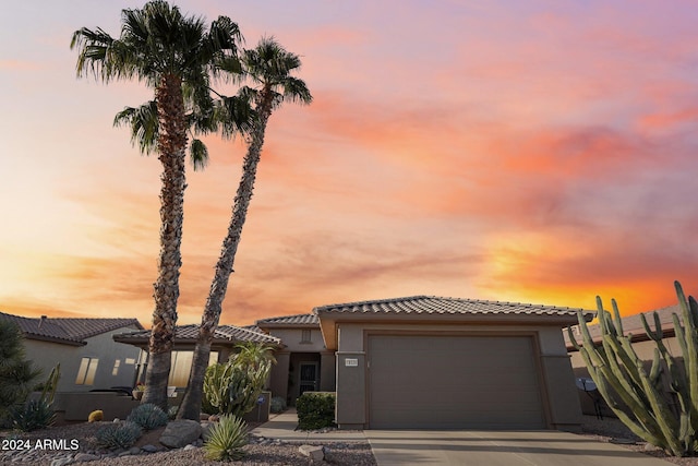 view of front of property with a garage