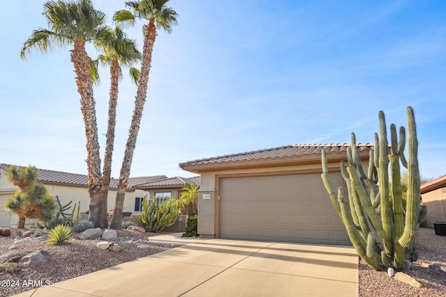 view of front of home with a garage