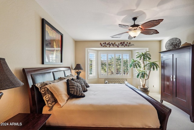 bedroom featuring ceiling fan