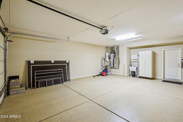 garage with sink and a garage door opener