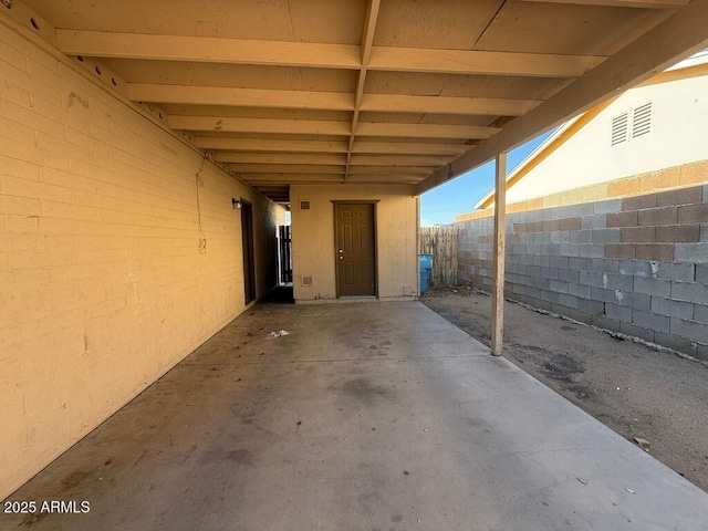 view of patio / terrace featuring fence