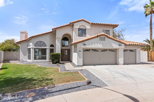 3520 N 110th Ave, Avondale, AZ 85392 - mediterranean / spanish-style house with a chimney, fence, a garage, and concrete driveway