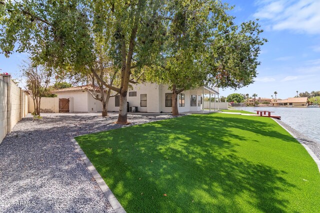 3520 N 110th Ave, Avondale, AZ 85392 - exterior space featuring a water view and fence